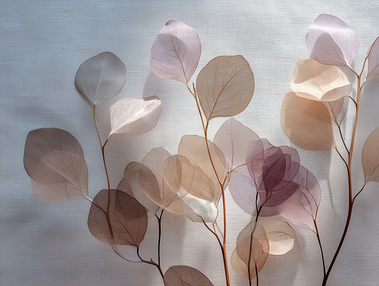 Soft blush eucalyptus leaves with translucent layers on textured background – botanical wall art.