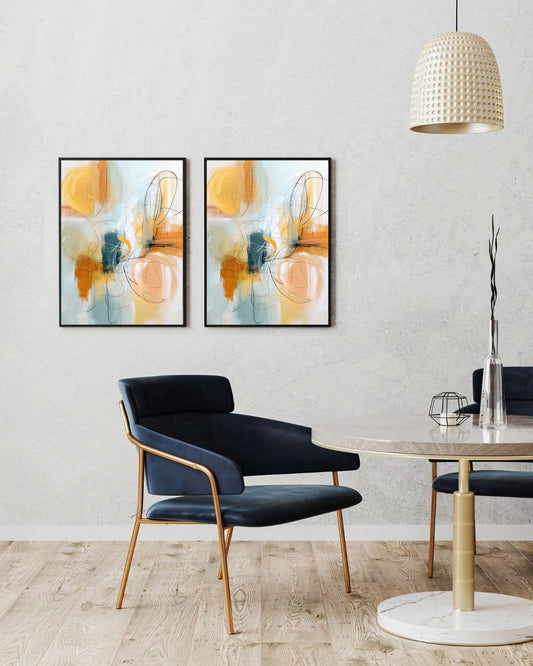 Abstract pastel artwork with peach, blue, and warm golden flowing tones.