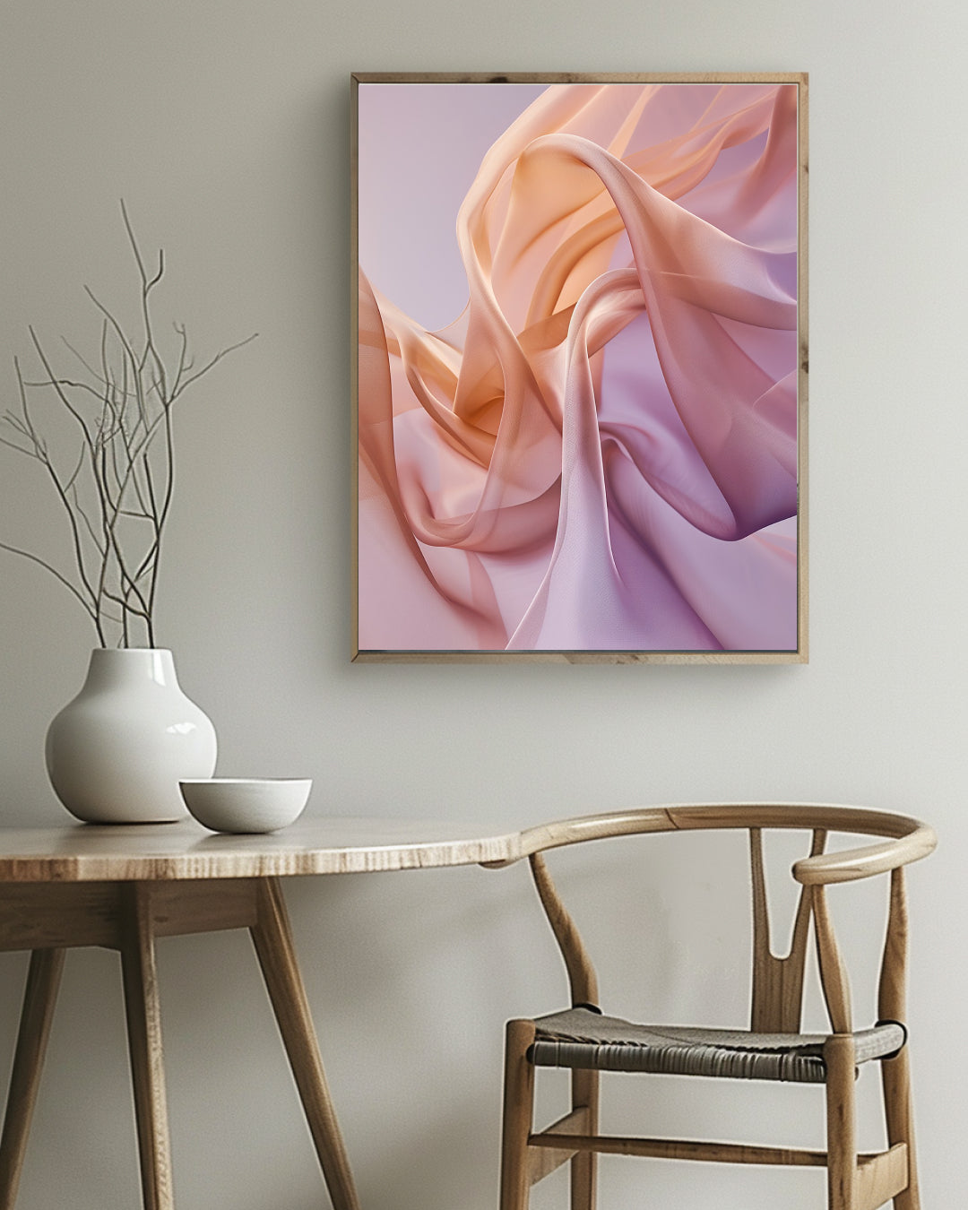 Abstract art piece on a wall above a table with a vase and bowl.